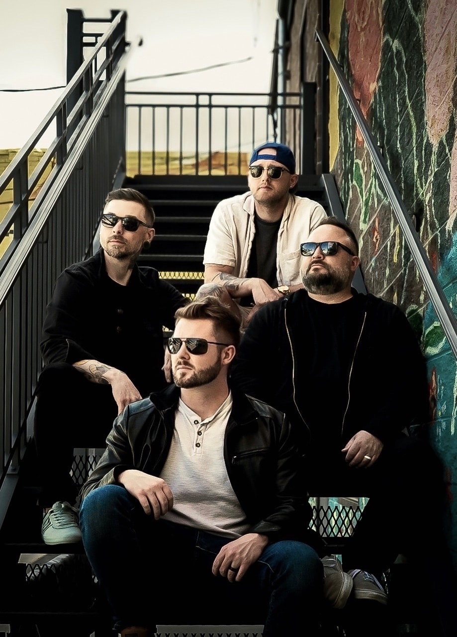 Rise Up Revival band promo photo on industrial staircase